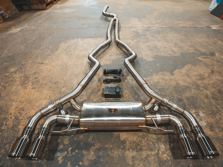 A top overview of Valvetronic Designs Valved Sport Exhaust System with Chrome exhaust tips on the ground (for BMW G20/G22 M340i/M440i). 