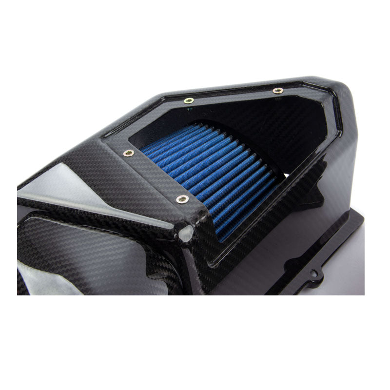 A close up view of Dinan Cold Air Intake for for BMW air filter with white background