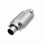 MagnaFlow 441064 universal catalytic converter, opposite front three-quarter view of the turntable spin