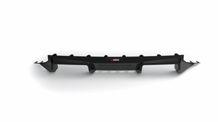 A front view of Akrapovic Rear Gloss Carbon Fiber Diffuser - for 2023+ BMW M2 (G87) with white background